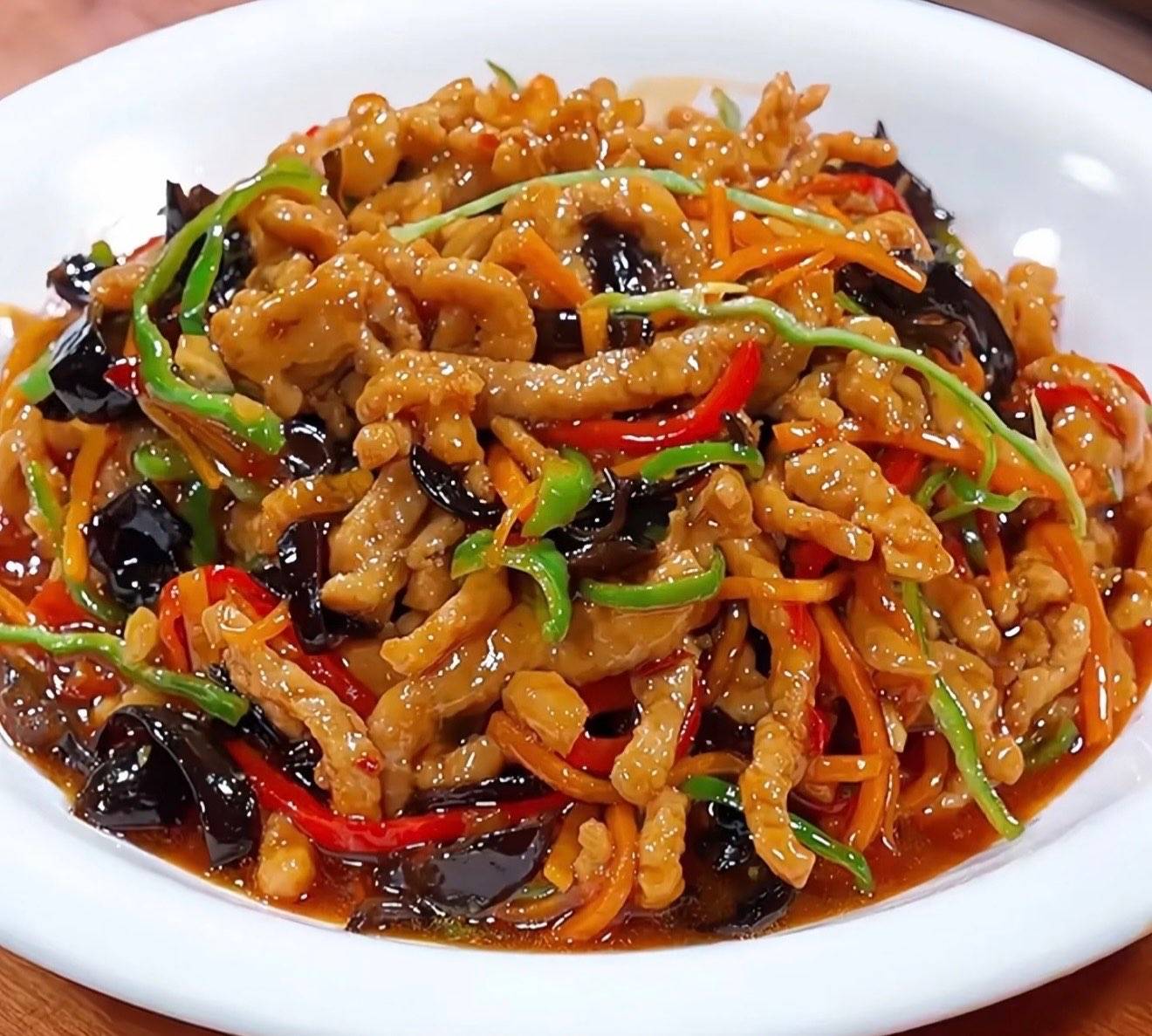 鱼香肉丝 Feine Schweinefleischstreifen in würziger Yu-Xiang-Sauce