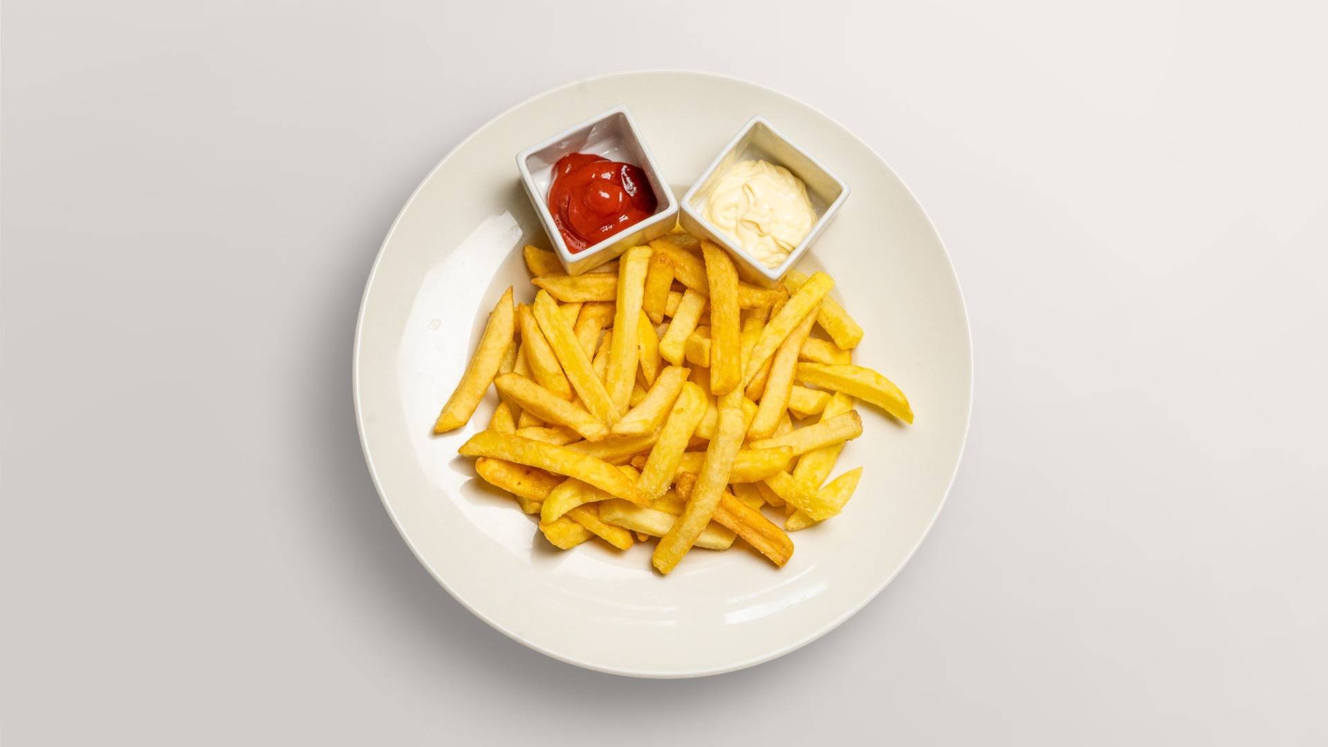 French fries with ketchup and mayonnaise