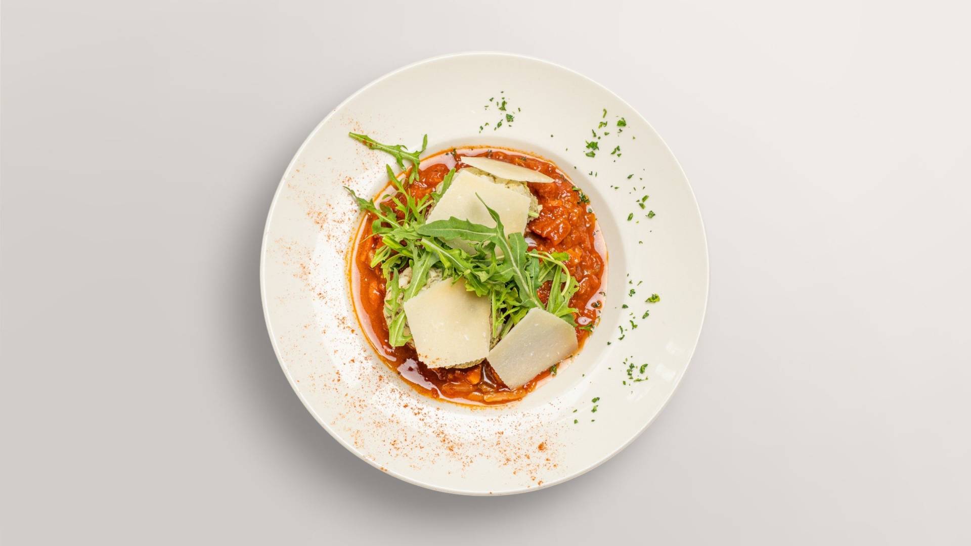 Herb bread dumplings with tomato sause