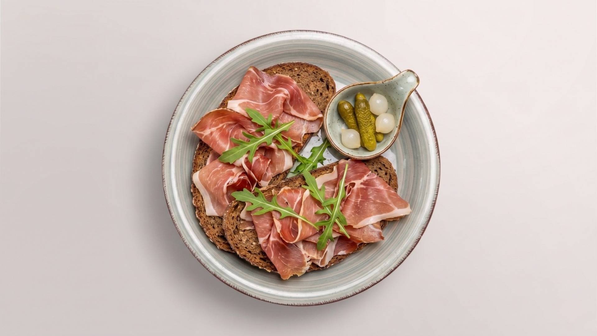 Dark rye bread with cured ham